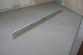 Выравнивание бетонного пола
